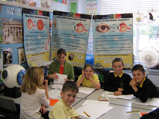 Scientist and Year 6 pupils during a TSN session